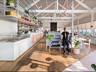 Inside Island Market at Trigg: a long white bar under a timber roof, with windows to the sea