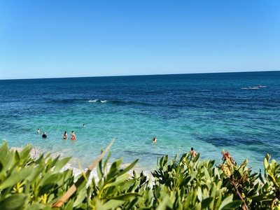Swimmers in the turquoise lagoon at Mettams Pool