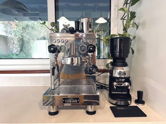 Espresso machine and grinder on the kitchen bench